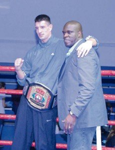 Robert Krlin of ESV Rot-Weiss Stuttgart, is named the best overall boxer and wears a championship belt presented by Command Sgt. Maj. Bernard P. Smalls, USAG Stuttgart’s senior enlisted advisor at the conclusion of Rumble in the Gart. Greg Jones