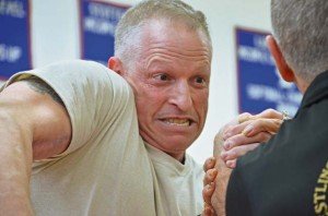 Photo by S. J. GradyAlec Ross, assigned to Special Operations Command Africa, gives it everything he’s got during a match in the Men’s Novice 177-198 pound left-handed class.