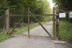Wooden gates to the wildlife preserve are not meant to keep visitors out, but to keep protected wildlife in. Visitors are welcome to enter these areas through these gates, but are reminded to close the gate after entering or exiting.