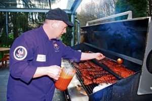 Dirk Yeaton, chef for the Murphy-Goode Winery, slathers ribs with his not so secret sauce at Patch Community Club March 26. Yeaton, who openly shares all of his recipes, visited several  USAG Stuttgart locations March 26 and 27, preparing food and sharing cooking tips.