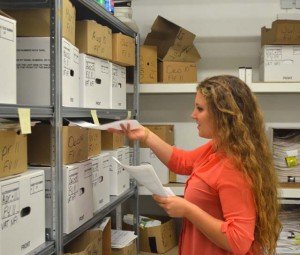 Summer Hire participant Mackenzie D’Andrea  files VAT paperwork at the Value Added Tax/Utility Tax Avoidance Program Office on Panzer Kaserne July 23. 