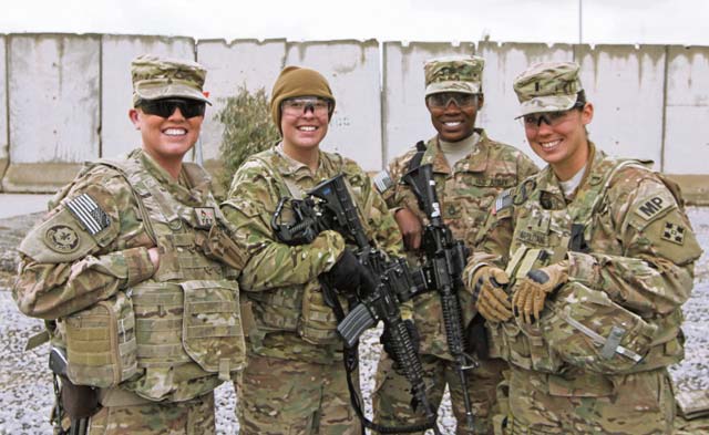 Photo by Cpl. Mariah BestMembers of the Regional Command (South) female engagement teams pose for a picture after a graduation ceremony for the first all-female Afghan National Police basic patrolman’s course class at the Joint Regional Afghan National Police Center, Kandahar, Afghanistan, earlier this year. While male and female Soldiers share some basic health requirements for readiness, female Soldiers require health screenings that are unique to the health of women.