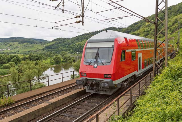 Photo by Thinkstockphotos.comThe distinctive red and white trains of the Deutsche Bahn national transit service zip back and forth across Germany delivering passengers between major cities and hubs.