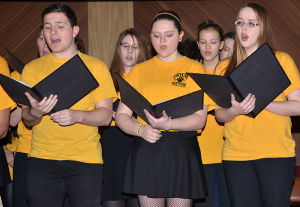 Members of the Patch High School choir, led by musical director Alan Landers, sing “Good Night, Dear Heart,” and followed it with “Ain’t Judgin’ No Man,” during the Martin Luther King Jr. observance held in the Patch Chapel. Photo by S.J. Grady, USAG Stuttgart Public Affairs Office.