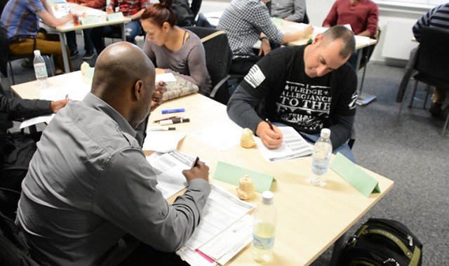 Students take notes during resilience training which is now part of the USAG Stuttgart in-processing program. Resilience training is offered to service members, civilians and family members as well.
