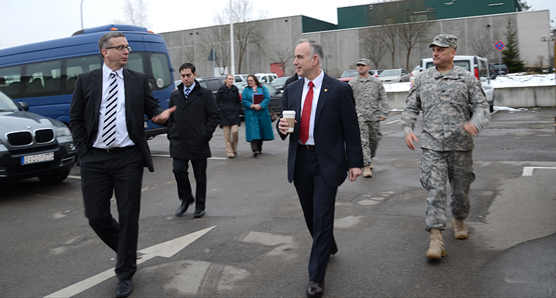 Michael Formica, (center) the IMCOM Europe region director, is escorted by Col. John P. Stack, the USAG Stuttgart garrison commander (right), and Carl Pritchard, the director of Public Works (left) , to the Patch Child Development Center during Formica's visit Feb. 10. The region director was here to talk with garrison leaders, get a firsthand look at ongoing construction projects and discuss ways that IMCOM can support the garrison's infrastructure challenges. — Photo by S.J. Grady, USAG Stuttgart Public Affairs Office.
