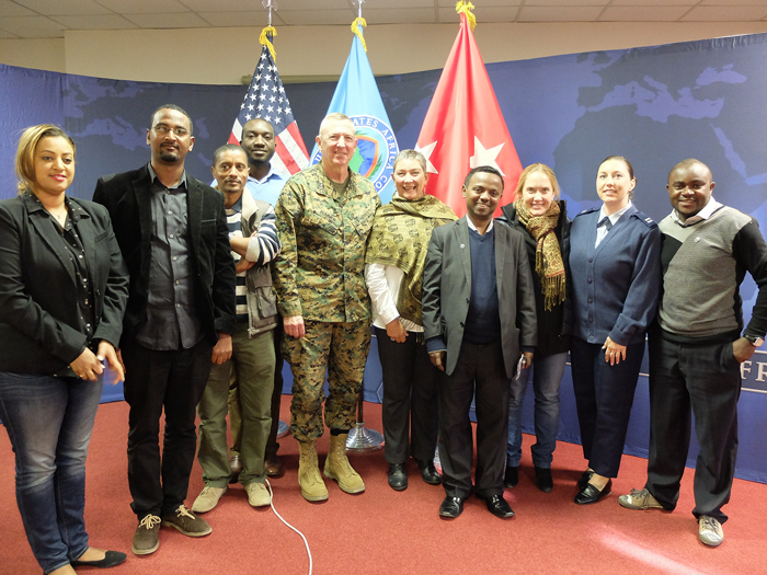 A delegation of AU journalists visit U.S. Africa Command to learn about the command’s mission and programs. The media delegation visit held Feb. 9-12 was an outreach program developed by AFRICOM Public Affairs to educate and inform top journalists from across Africa about AFRICOM. Pictured left to right are Lina Mohammed Ibrahim from the U.S. Mission to the AU, who served as escort for the AU journalists; Elias Meseret Taye, AP correspondent for Ethiopia and AU; Andualem Sisay Gessesse, correspondent to Nation Media Group of Kenya, based in Addis Ababa Ethiopia; Emmanuel Igunza Kinyaga, BBC Africa’s bilingual correspondent in Ethiopia and Kenya; U.S. Marine Corps Lt. Gen. Steven Hummer, AFRICOM's Deputy to the Commander for Military Operations; Jenine Coetzer, executive producer, English Current Affairs at Channel Africa in Johannesburg, South Africa; Eskinder Firew Azmatch, reporter for Voice of America Amharic, based in Addis Ababa, Ethiopia; Robyn Lee Kriel, eNews Channel Africa’s East Africa Bureau chief, based in Nairobi, Kenya; U.S. Air Force Capt. Tamara Carter-Fischer, Media Officer with AFRICOM Public Affairs and lead coordinator for this visit; and Aggrey Mutambo Nyongesa who writes on foreign relations and regional humanitarian affairs for Kenya’s Daily Nation newspaper. – Photo by Brenda Law, AFRICOM Public Affairs.