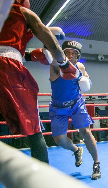 Andres Amaya, of Team Stuttgart, advances on teammate Dedric Stringfield in bout six of USAG Stuttgart’s invitational boxing tournament, Rumble in the Gart--Photo by Virginia Kozak, special to the Citizen.