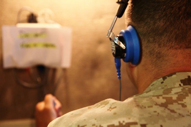 Staff Sgt. Charles Mitchell, 34, from Carlsbad, Calif., Edson Range’s post exchange manager, Service Company, Combat Logistics Regiment 17, 1st Marine Logistics Group, takes the annual audiogram test on Camp Pendleton, Calif., July 13. The Marine Corps changed its policy to require all Marines to take the test annually in order to monitor and reduce the number of Marines leaving the military with hearing loss.
