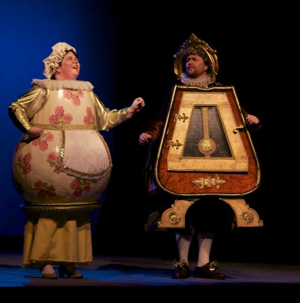 Tina Ramun as Mrs. Potts and Peter Watt as Cogsworth in Beauty and the Beast. 
