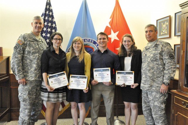 From left, Gen. David M. Rodriguez, commander of U.S. Africa Command (AFRICOM), Marie Goetzke, Marie Kate Adgie, Connor Hartzell, Victoria Smith, all interns at AFRICOM, and Command Sgt. Maj. Darrin J. Bohn, the command's senior enlisted leader, pose for a photo in Stuttgart, Germany, July 24. The interns were among the first to participate in the command's new internship program which is now accepting applications year-round.