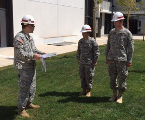 Photo Credit: Courtesy photo Army cadets Melissa Hersey and Patrick Richardson each receive a Certificate of Achievement from Maj. Edward Kim, U.S. Army Corps of Engineers Europe District's executive officer, during a presentation Aug. 5 at the Stuttgart elementary and high school construction project in Boeblingen, Germany. The pair were recognized for their work with the Stuttgart Resident Office as part of USACE's 2015 summer Cadet District Engineer Program.