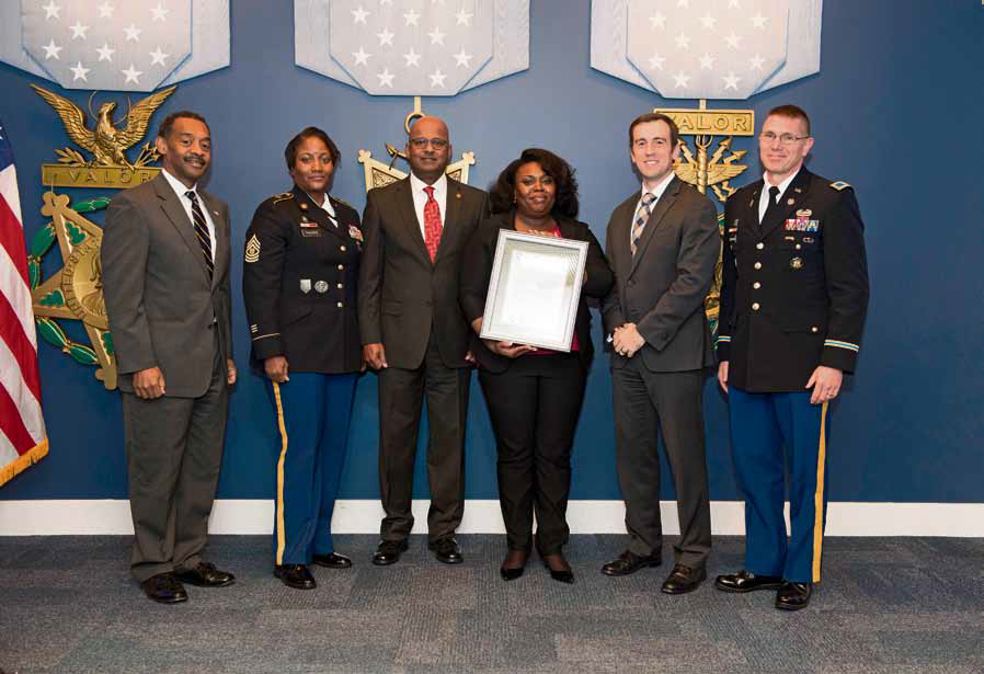 Representatives from the U.S. Army Garrison Stuttgart Army Substance Abuse Program were presented with a 2015 Department of Defense Community Drug Awareness Award at the Defense Department’s 25th annual Awards ceremony in the Pentagon’s Hall of Heroes Oct. 15. — Photo by Alfredo Barraza