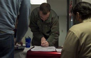 Senior Airman Jeffrey Corby, 786th Civil Engineer Squadron pest management journeyman, signs up for a CLEP during a CLEP-a-thon at Ramstein Air Base, Germany, Feb. 09, 2015. The CLEP-a-thon allows Airmen an opportunity to earn credits toward their Community College of the Air Force degree or any upper-level degree an individual may be working towards without having to schedule test dates weeks in advance. (U.S. Air Force photo/Senior Airman Damon Kasberg)