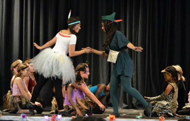 During Dance Production Studio’s production of Peter Pan and the Pirates Jackie Romo and Shayla Acar performed with the “Indians”, ages 9-11, as Tiger Lily and Peter Pan.