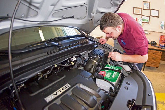 People that are shipping their vehicle need to clean out the engine compartment. Vacuum out any pine needles, dirt, dead bees, seeds, etc., and either wipe it off or wash it off prior to inspection. — Photo by Kevin S. Abel