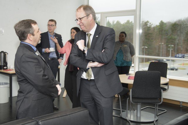 Rick Calnon, U.S. Army Garrison Stuttgart director of human resources, and Rüdiger Bechstein, Kärcher executive vice president of human resources, talk during a workforce development exchange hosted by USAG Stuttgart March 2. The session is part the USAG Stuttgart Mentorship Program. Photo by Kevin S. Abel