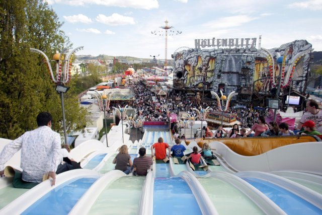 “Slide into spring” at the “Stuttgarter Frühlingsfest,” or spring festival, from April 16 to May 8 at the Cannstatter Wasen fest grounds in Bad Cannstatt. The fest offers activities for the entire family to include fun rides, beer tents, regional and international foods, and a reconstruction of a Bavarian-Austrian Alp village, the “Almhüttendorf.” – Photo courtesy of in.Stuttgart/Thomas Niedermüller.