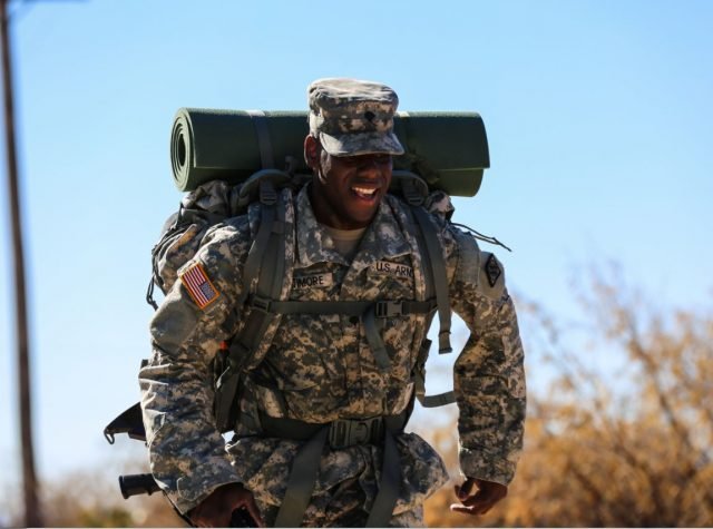 U.S. Army Spc. Samuel Latimore, attached to 52nd Signal Battalion, finishes the last stretch of the ruck march during the 2016 Network Enterprise Technology Command Best Warrior Competition held at Fort Huachuca, Ariz., June 14, 2016. The competition is a grueling weeklong event that tests the skills, knowledge, and professionalism of 10 warriors representing the 5 commands within NETCOM. (U.S. Army photo by Pfc. Michael Parnell/Released)