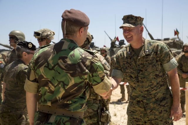 Photo By Staff Sgt. Tia Nagle | General Frederico Rovisco Duarte, Portuguese Army Chief of Staff, thanks U.S. Marine Corps Lt. Col. Sean Wilson, operations officer of the Special Purpose Marine Air-Ground Task Force-Crisis Response-Africa, for the Marines’ participation in Exercise Orion 16 at Campo Militar de Santa Margarida, Portugal, July 2, 2016. The Portuguese military invited distinguished visitors from various countries for a demonstration from Portuguese and American forces to conclude Exercise Orion 16. (U.S. Marine Corps photo by Staff Sgt. Tia Nagle/Released)