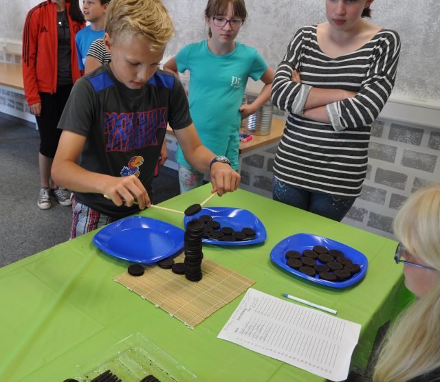 Stuttgart youth compete in the Oreo Olympics at the Patch Library, July 18, 2016. Photo by: Sianne Jusino-Vega.