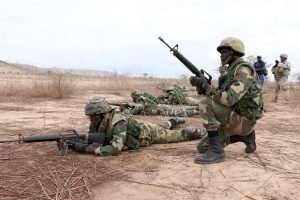 Senegalese soldiers with the 1st Paratrooper Battalion provide security during a platoon live-fire exercise as U.S. Army soldiers of 1st Battalion, 30th Infantry Regiment, 2nd Infantry Brigade Combat Team, 3rd Infantry Division observe in Thies, Senegal, as part of Africa Readiness Training 16, July 21, 2016. The exercise is one of many on the continent. U.S. Army photo by Staff Sgt. Candace Mundt 