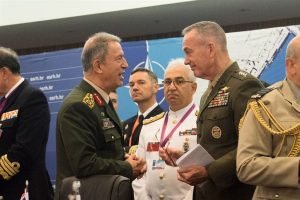 Turkey’s chief of defense, Gen. Hulusi Akar, left, and Marine Corps Gen. Joe Dunford, the chairman of the Joint Chiefs of Staff, talk between sessions during the NATO Military Committee conference in Split, Croatia, Sept. 17, 2016. The alliance’s chiefs of defense discussed current events and implementing the decisions made at the recent NATO summit. DoD photo by D. Myles Cullen 