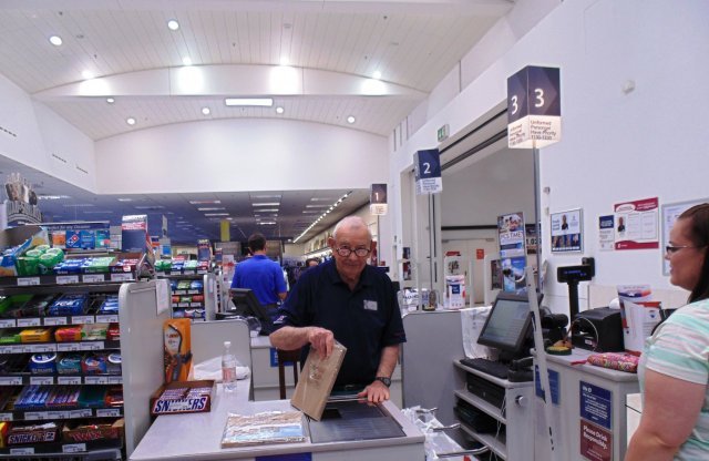 Jack Goldman, 90, has a military career spanning three decades and deployments during World War II and the Korean and Vietnam wars. Today, Goldman continues his service to his country and the military community by working as a cashier at the Panzer Exchange. AAFES photo. 