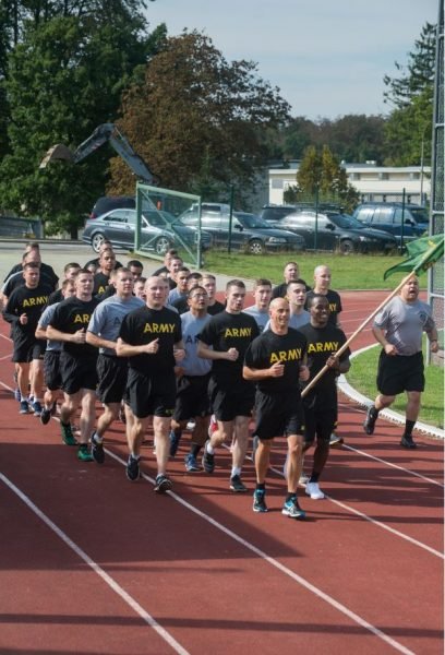 Col. David J. Segalla, Jr., division chief, ACJ34, U.S. Africa Command leads Soldiers from across U.S. Army Garrison Stuttgart in the final lap of the U.S. Army Military Police Corps’ 75th Anniversary Regimental Run, Sept. 28, 2016 at Husky Field on Patch Barracks in Vaihingen, Germany. U.S. Army Photo by Martin Greeson.