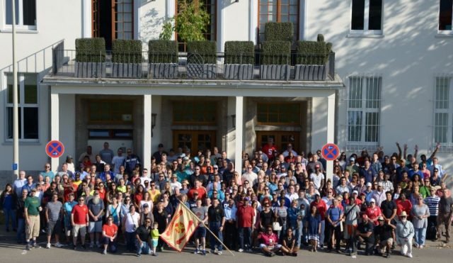 The U.S. Army Garrison Stuttgart workforce gathers for a group photo in front of the command building on Panzer Kaserne during Organization Day, Sept. 2, 2016. Photo by Jason Johnston