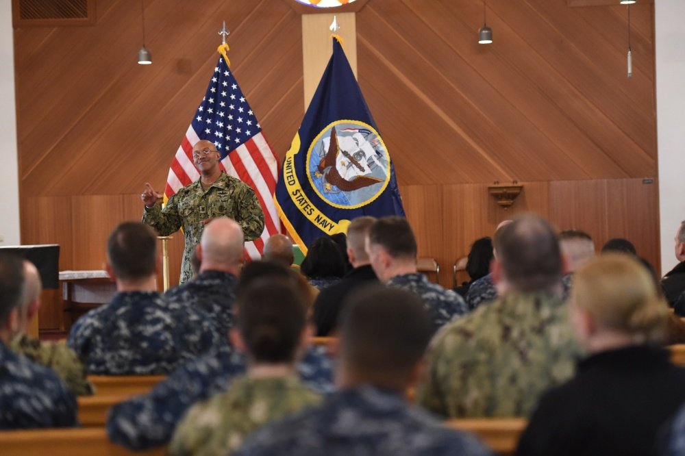 Master Chief Petty Officer Raymond Kemp, U.S. Naval Forces Europe-Africa's Senior Enlisted Leader, speaks to Sailors assigned to U.S. European Command during an all-hands call. Kemp provided updated information regarding the Enlisted Rating Modernization program, answered questions and provided guidance regarding the service's way ahead. The Navy recently announced the program which converts rating names and their abbreviations to alphanumeric codes known as Navy Occupational Specialties. (U.S. European Command photo by Master Sgt. Chuck Larkin Sr.