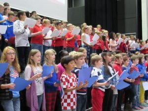 Students of Stuttgart Elementary School sing during a Veterans Day Recognition Ceremony on Panzer Kaserne, Nov. 10, 2016. Photo by Daniel L'Esperance.