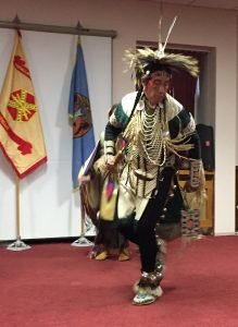 Staff Sgt. Lionell D. Red Cloud, a member of the Oglala Sioux Tribe from South Dakota and current Military Police officer speaks about his heritage at the National American Indian Heritage Month ceremony, Nov. 15, 2016 on Kelley Barracks, Stuttgart, Germany.