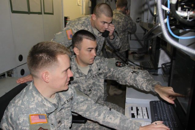 An operations crew inside the Stuttgart JTAGS watches over the European Command theater in this 2012 photo. Photo by Dottie White, U.S. Army Space and Missile Defense Command, Army Forces Strategic Command.