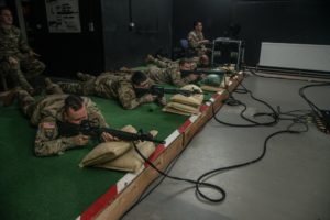 U.S. Soldiers train using the Engagement Skills Trainer II (EST II) at the Panzer Range Complex near Böblingen, Germany, May 10, after a recent upgrade from the older version EST 2000. The EST II provides greater accuracy, higher quality graphics, expanded tutoring capabilities and will allow for greater number of lanes. EST supports ground combat readiness as the Army’s virtual Basic Rifle Marksmanship training system. U.S. Army Photo by Visual Information Specialist Martin Greeson. 