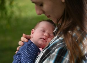 Mother holding baby