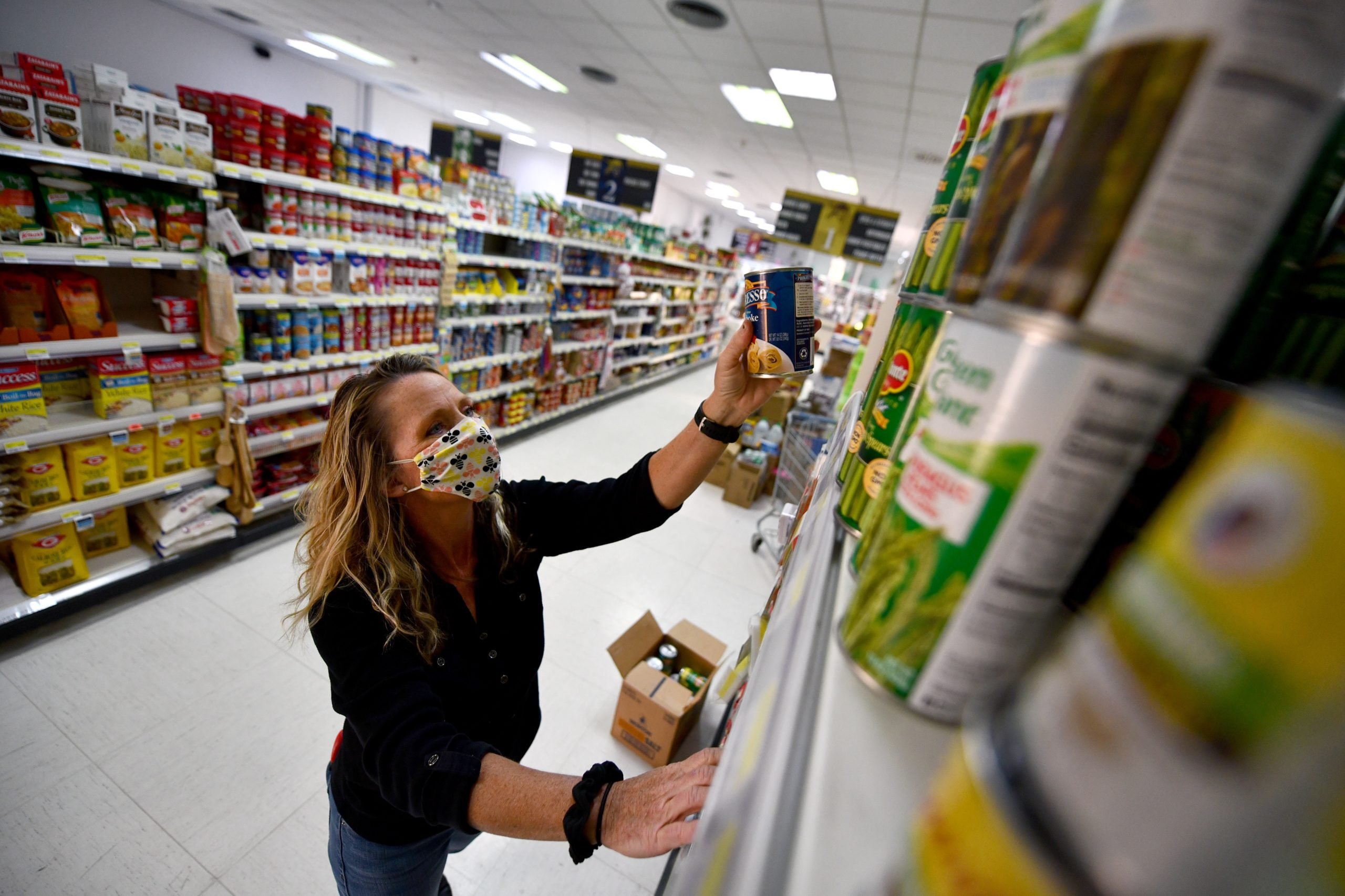 volunteer stocking shelves