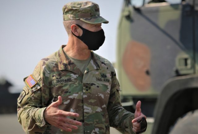 An Army Major General addresses troops
